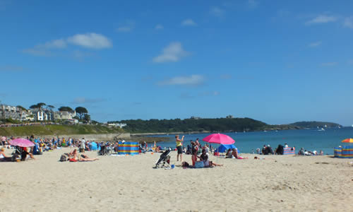 Holiday makers at the beach in Falmouth, Cornwall